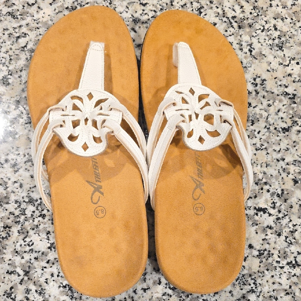 White and Tan Flat Sandals with Ornate Cutout Design